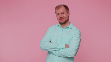 cheerful lovely bearded adult man fashion model in casual shirt smiling and looking at camera alone