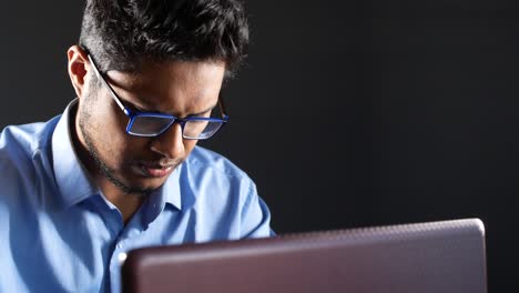 man working on laptop