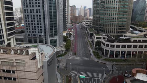 Empty-City-Streets-during-Shanghai-Covid-19-Pandemic-Lockdown,-Aerial-Flight