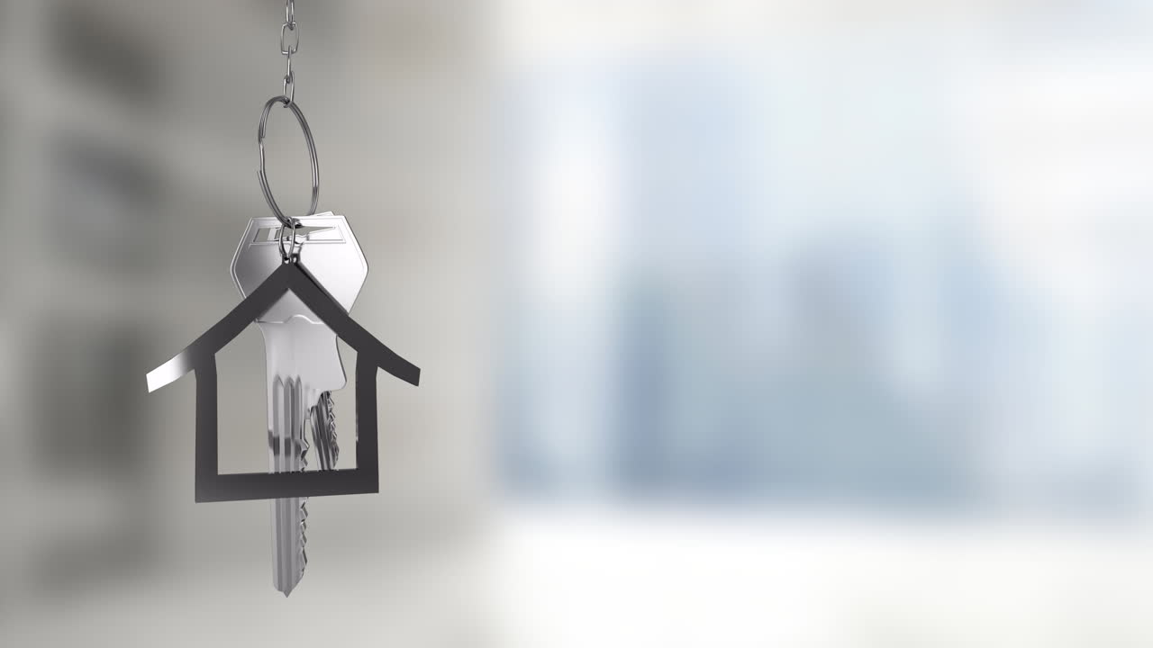 Portachiavi animato a forma di casa e chiavi su sfondo sfocato di paesaggio urbano