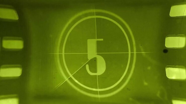 Vintage Film Countdown Leader with Green Tint and Film Grain