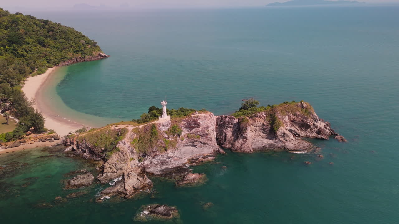 Aerial View of a Lighthouse on a Tropical Island
