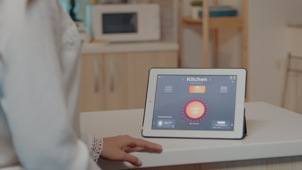 Young woman using smart home application with voice command