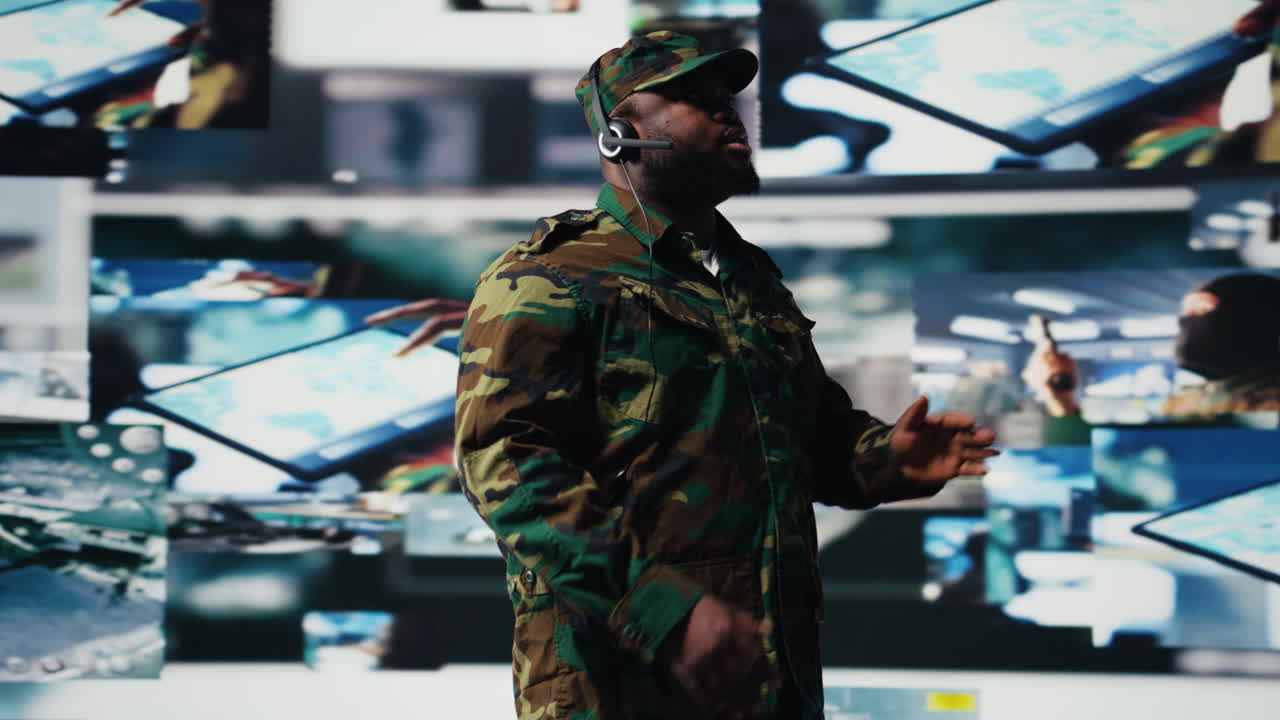 Black soldier guiding troops with satellite coordinates to create tactics