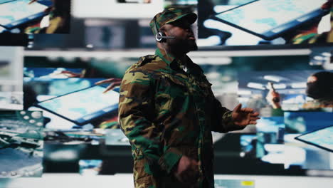 black soldier guiding troops with satellite coordinates to create tactics