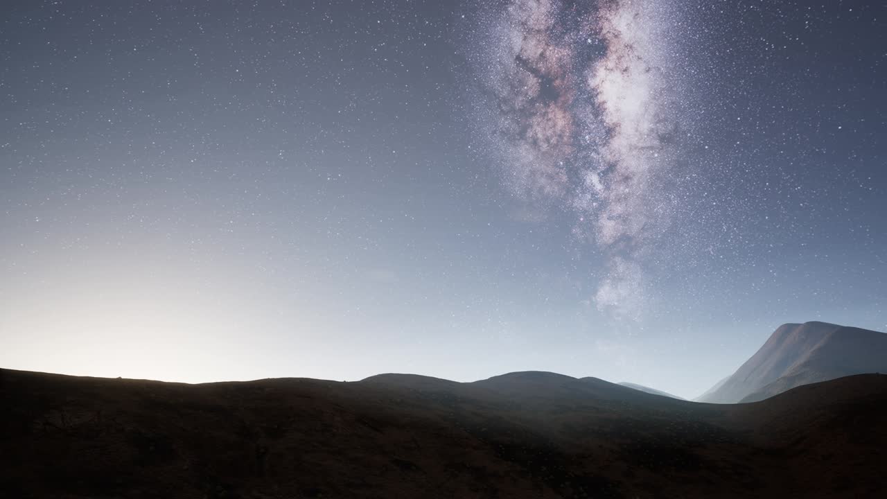 사막의 산 위에 있는 은하계의 별들
