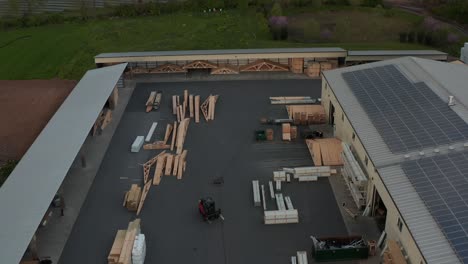 aerial pullback reveals large lumberyard