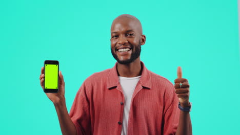 Green-screen,-phone-and-man-thumbs-up-for-success