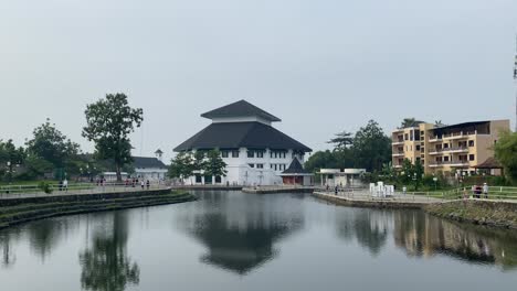 morning atmosphere outside giwangan reservoir yogyakarta. visitors enjoy the morning by walking around the reservoir to stay healthy and fit.