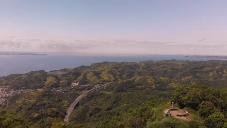 Lush-Green-Forest-Overlooking-The-Blue-Ocean-During-Summer-In-Japan-At-Daytime