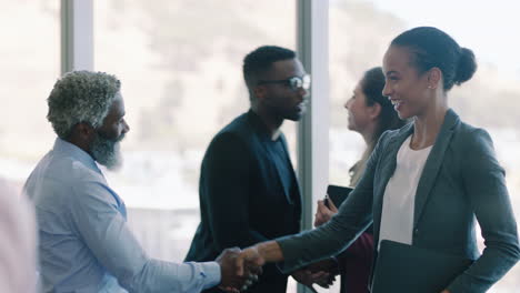 diverse business people meeting shaking hands in boardroom preparing for conference collaborating with clients shareholders planning partnership deal in corporate office