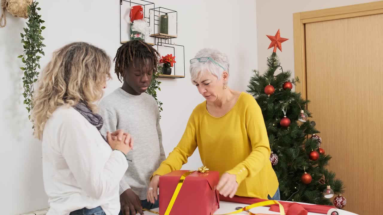 People wrapping Christmas presents