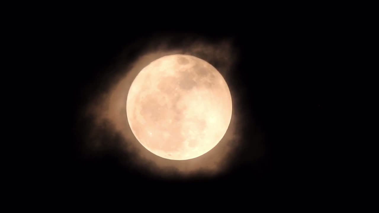 Lua laranja animada isolada em fundo preto