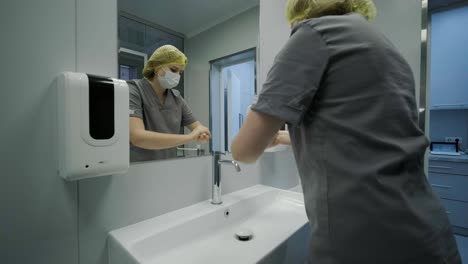 preparing for surgery operation, the doctor washes hands before surgery