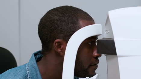 man doing eye test