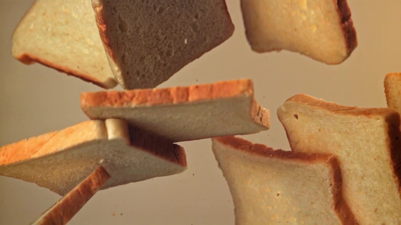 Slow Motion of White Bread Slices Floating and Falling