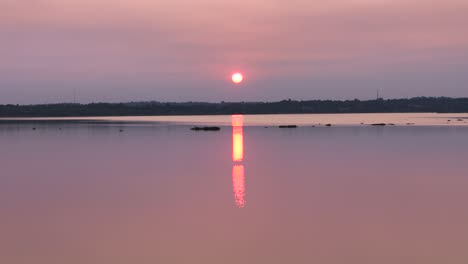 a drone's-eye view of a stunning sunset over the paraná river