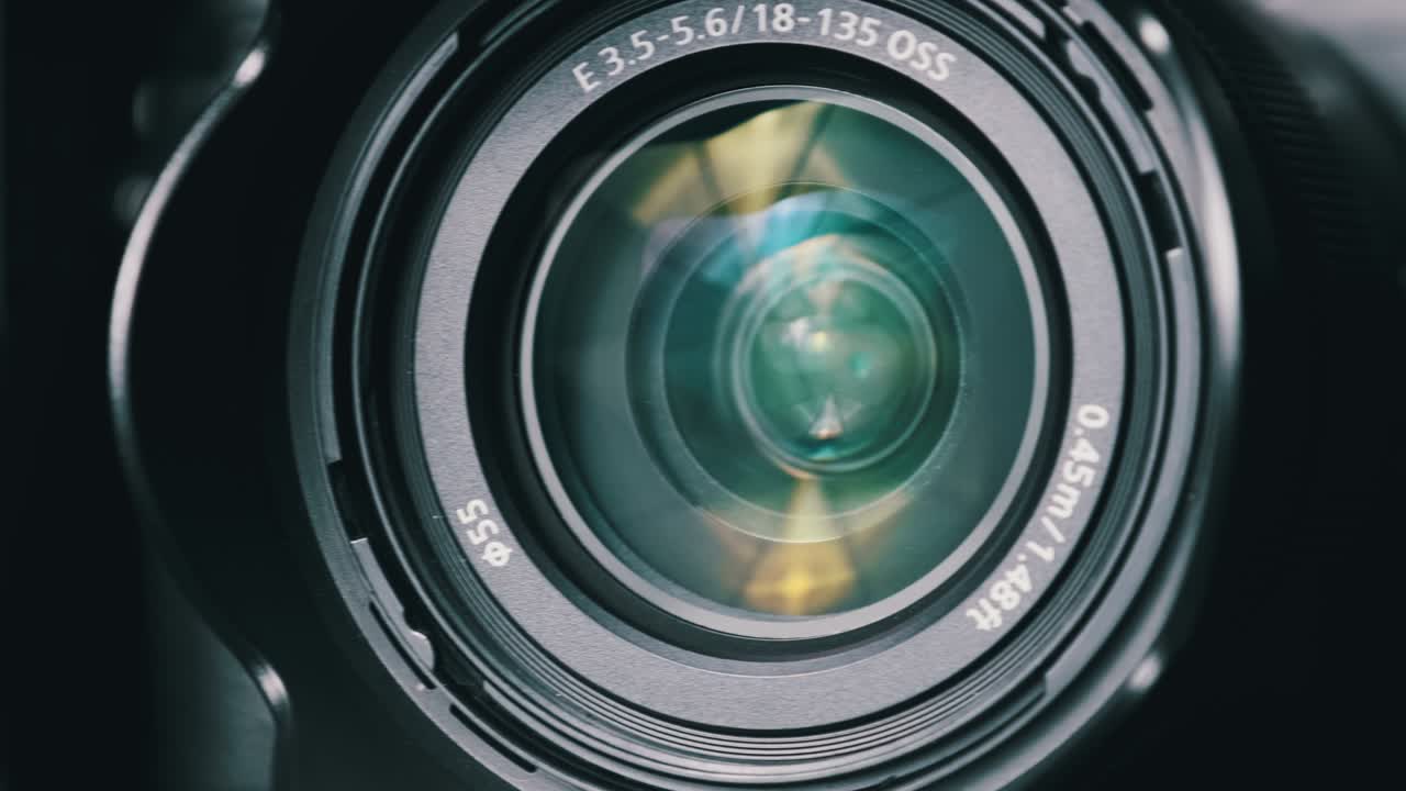 The Camera Lens Rotates, Lights Reflecting Off Glass, Robotic Camera Movement