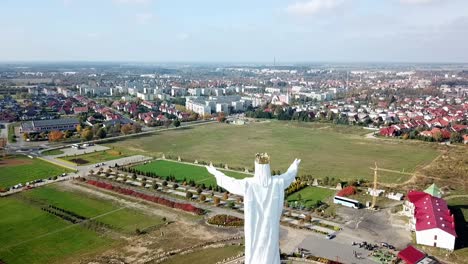 Drone-view-of-the-Christ-the-king-statue-in-Swiebodzin,-Poland,-Europe