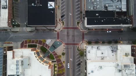 unoccupied streets of downtown city, empty due to covid-19, aerial overhead drone shot