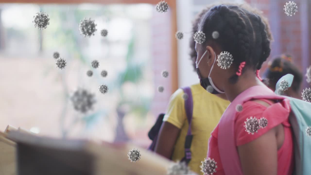 Kids at school kiosk, girl tapping screen checking pass, boy edging closer walking, virus floating