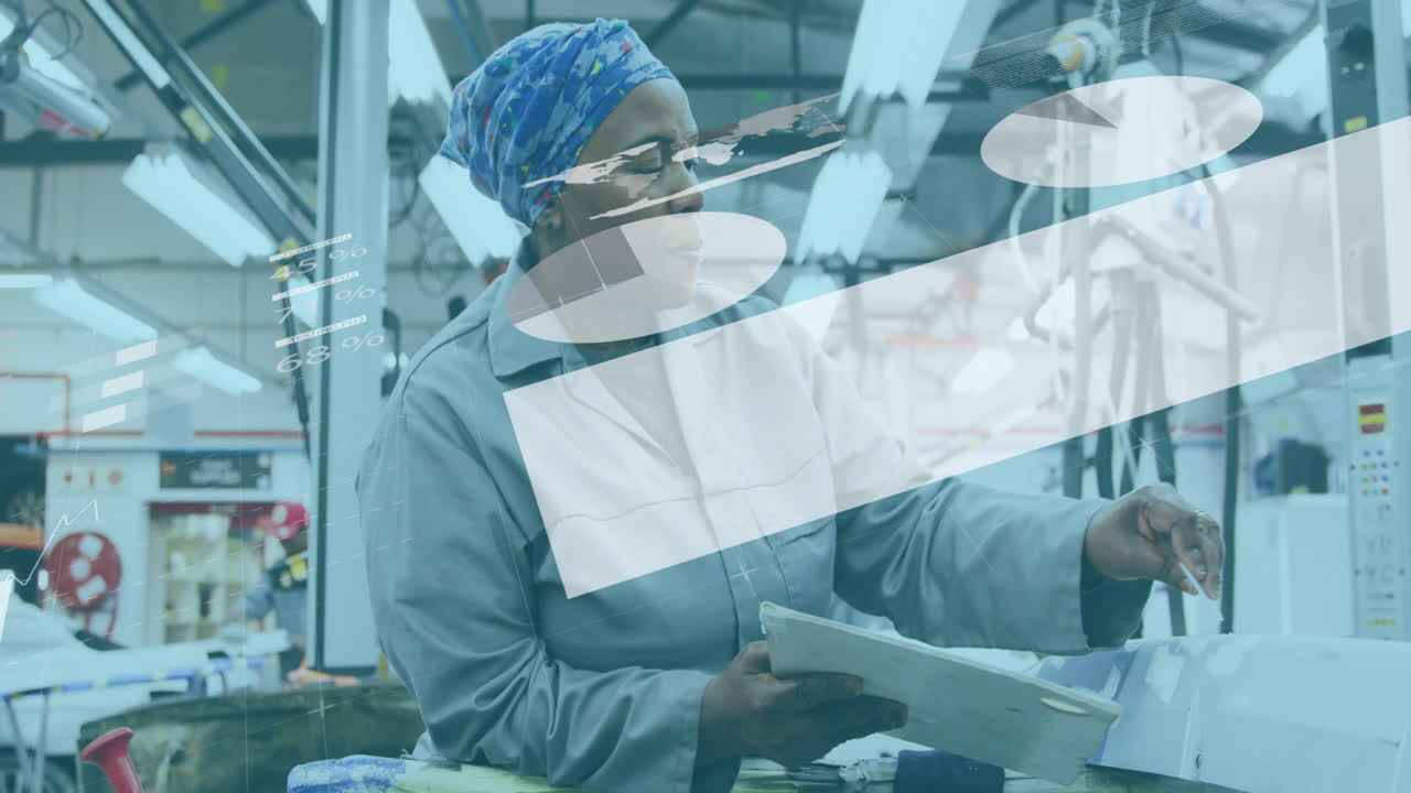 Animation of data processing over african american woman working in factory