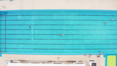 aerial - swimming pool at a sports club in buenos aires, argentina, top down rising