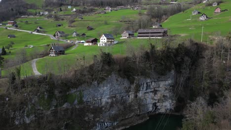 aerial view of an isolated town located on a high land in walensee, switzerland