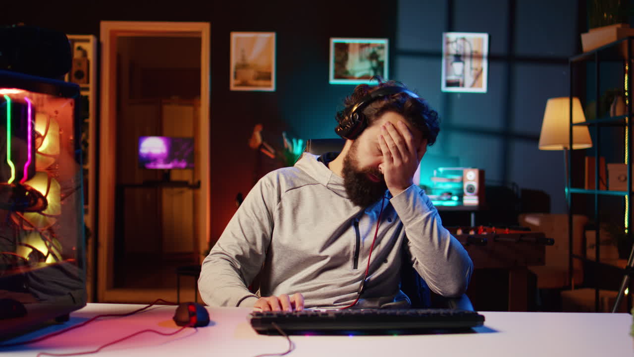 Player feeling stressed while competing with friends in multiplayer videogame, frustrated by loss