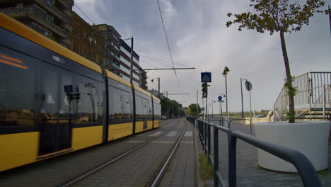 A-passenger-tram-runs-in-Budapest,-Hungary