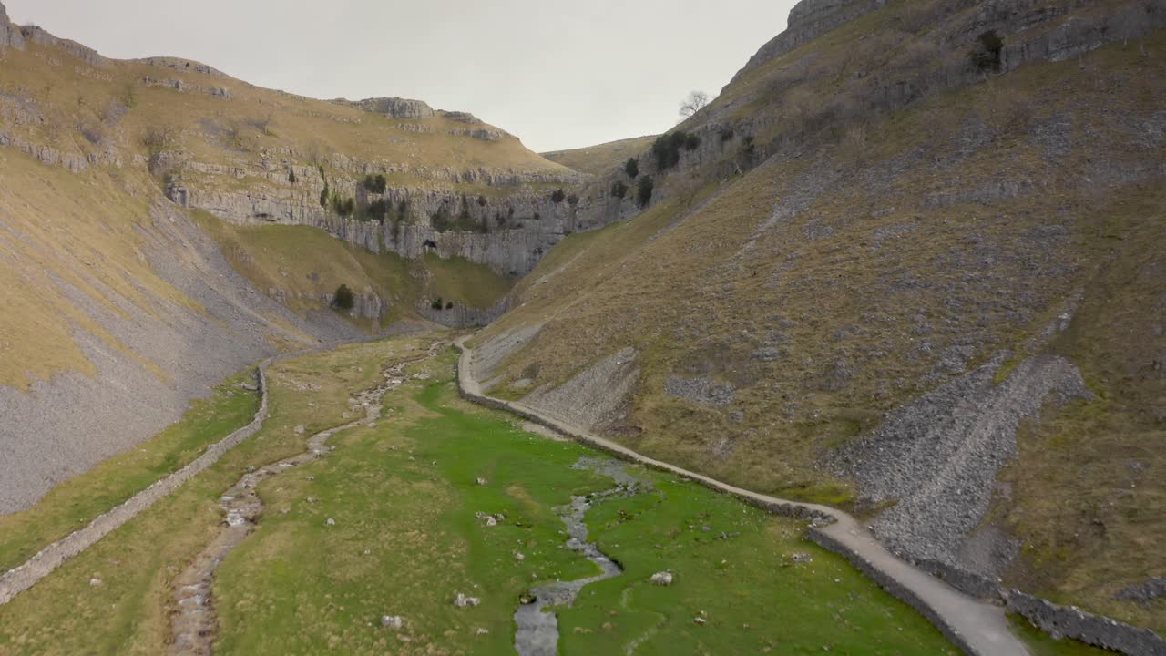 Aeriel footage Gordale Scar is a limestone ravine near Malham, North Yorkshire, England