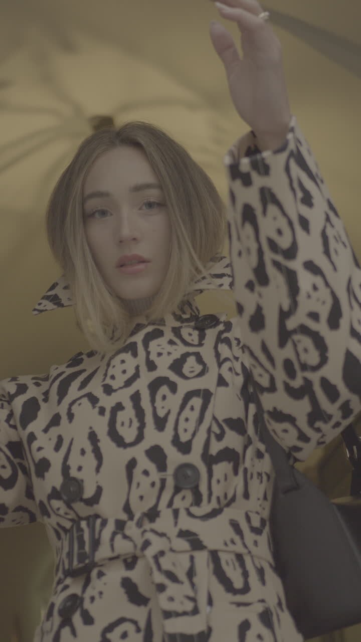 Stylish Woman in Leopard Print Coat