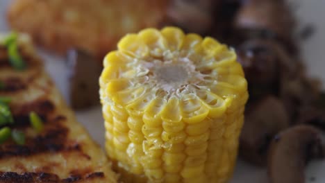 grilled breakfast with corn and mushrooms