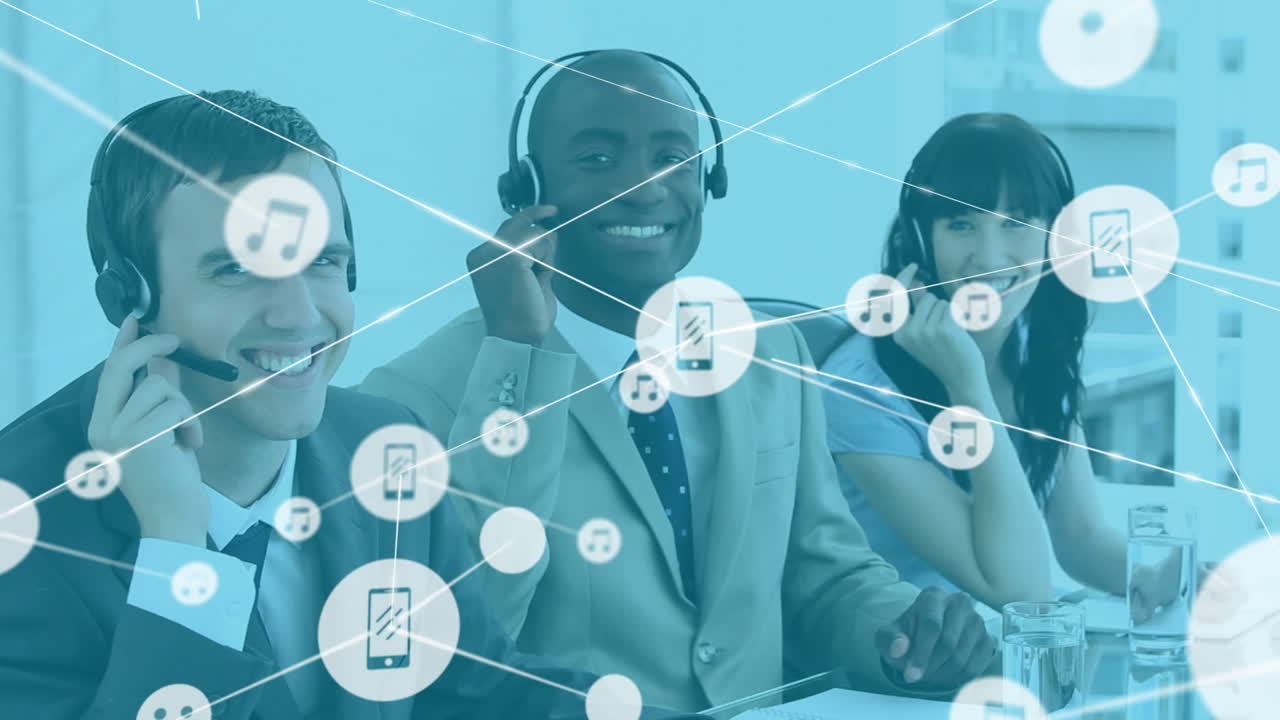 Animation of network of icons against diverse colleagues wearing phone headsets smiling at office