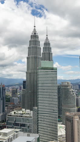 Kuala Lumpur petronas towers and skyline in vertical