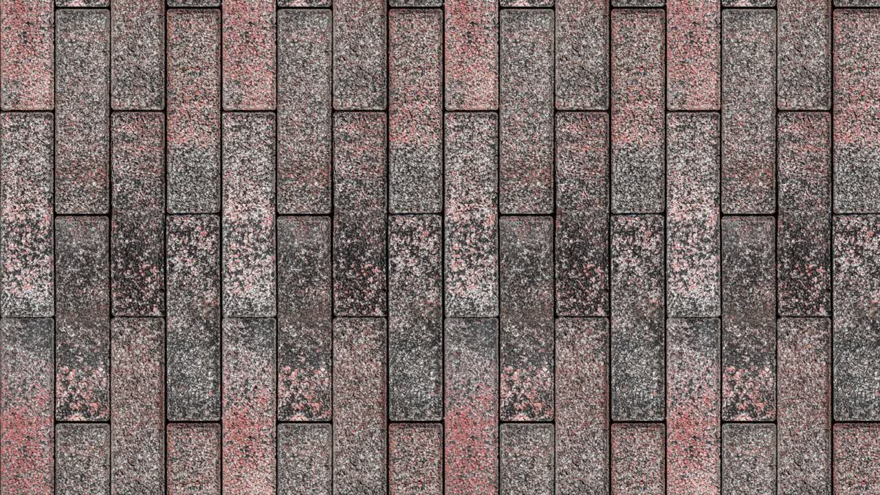 movimiento de bucle sin costuras. la pared está revestida con azulejos que imitan el granito de piedra natural. video orientado verticalmente.