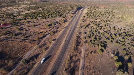 Aerial-View-of-Traffic-on-Arizona-State-Route,-Desert-Road-and-Landscape,-Drone-Shot