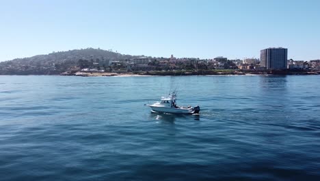 drone flys over parker boat in la jolla shores