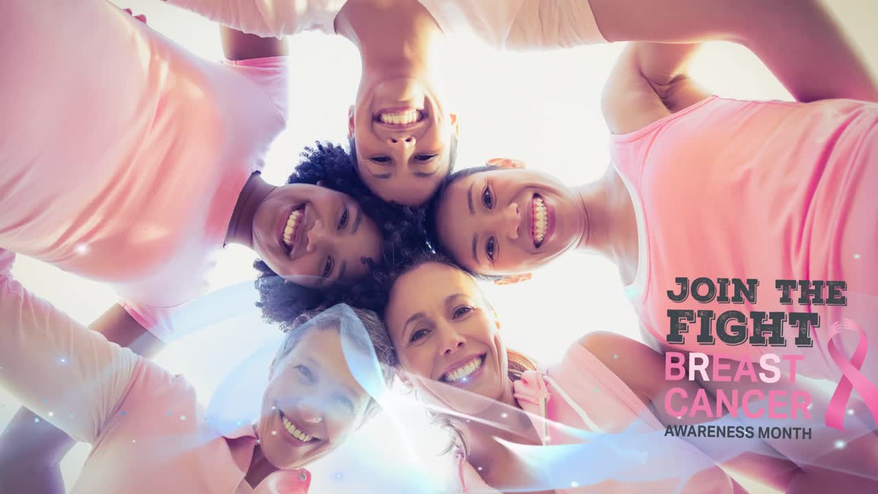 Animation of pink ribbon logo with breast cancer text over diverse group of smiling women
