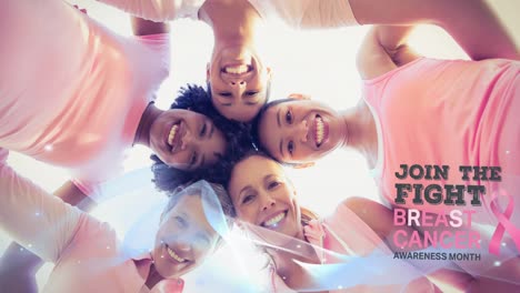 Animation-of-pink-ribbon-logo-with-breast-cancer-text-over-diverse-group-of-smiling-women