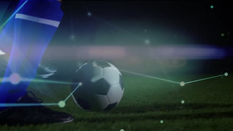 Animation-of-glowing-network-of-connections-over-mid-section-of-male-soccer-player-practicing-soccer