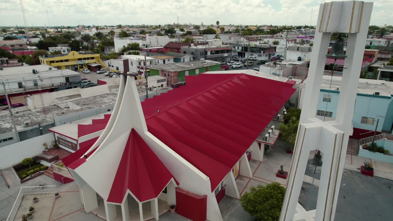 Aerial of church San P&iacute;o X at Reynosa, Tamaulipas, daytime capture, video sequence promoting religious and spirituality concept