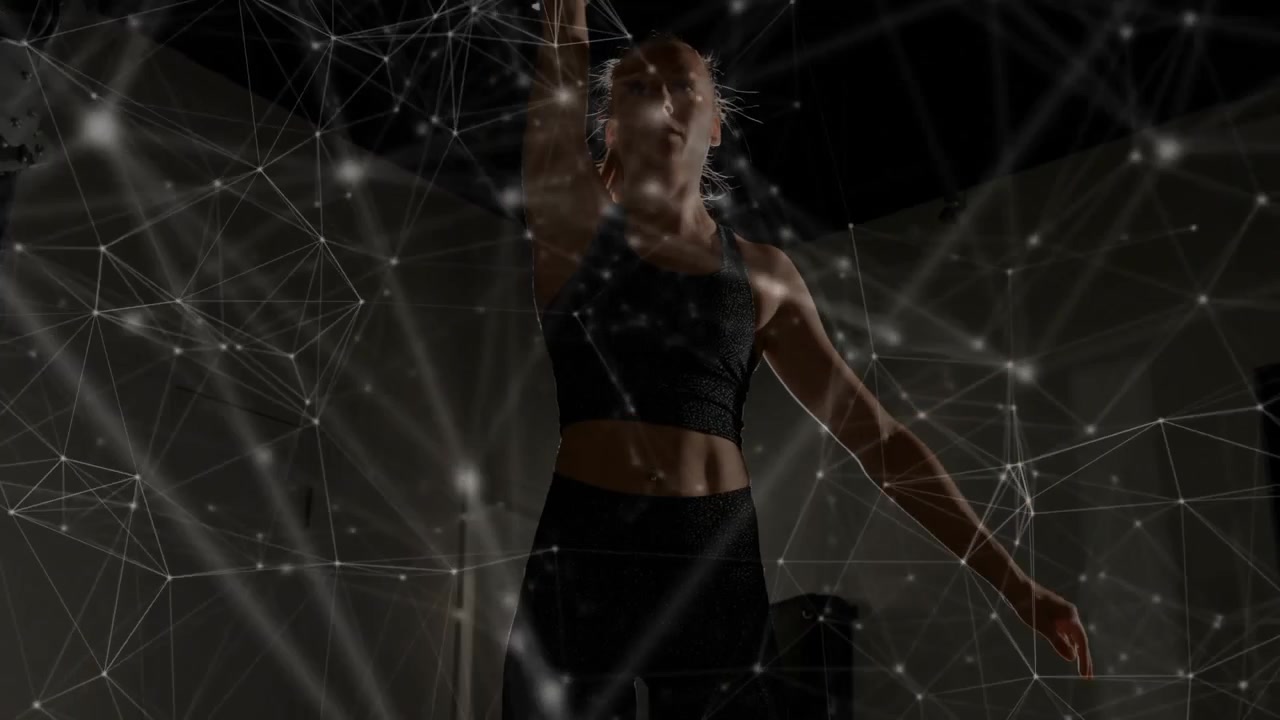 Fit athlete entering studio lifting kettlebell, swinging overhead pressing, network overlay pulsing