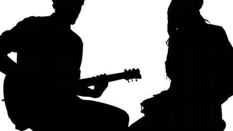 animation of black silhouette of men playing guitar and drums on white background