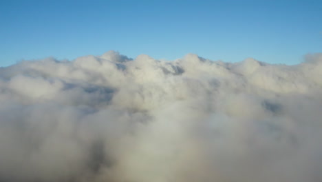 Aerial-View-of-bed-of-clouds-against-blue-sky
