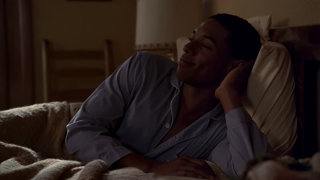 Man in bed at night