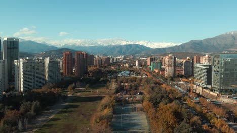 large and beautiful city park in las condes locale with extensive scenery of contemporary office buildings in santiago, chile