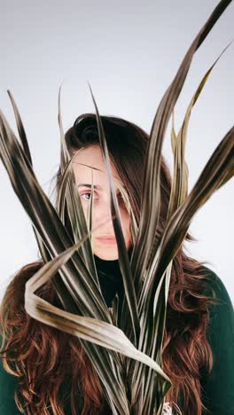 woman with leaves