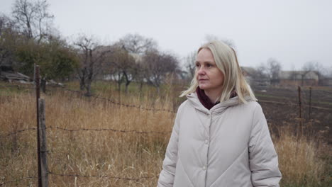 woman in a field on an autumn day