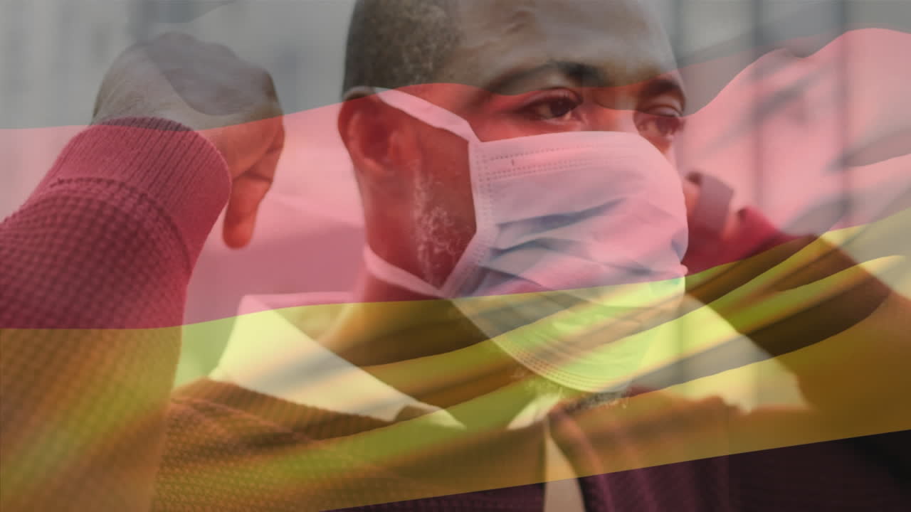 도시 거리에서 얼굴 마스크를 쓰고 있는 아프리카계 미국인 남자가 독일 국기를 흔들고 있는 애니메이션